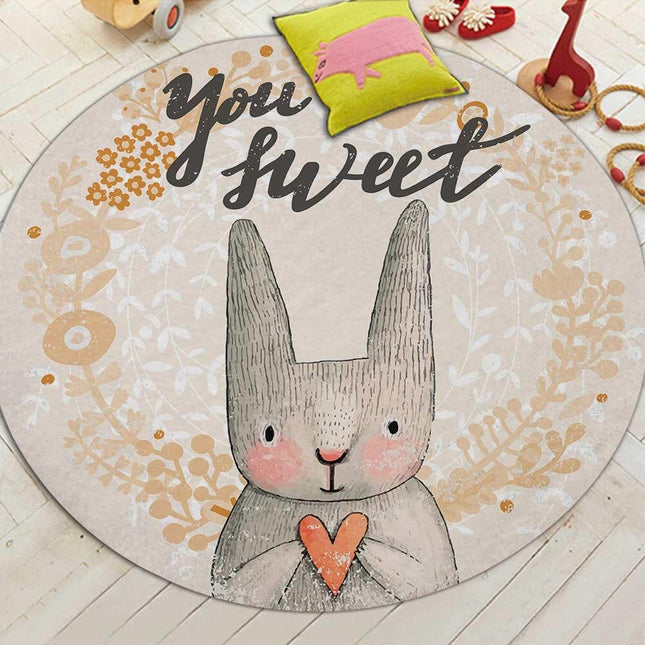 Kulatý koberec s kresleným králíčkem