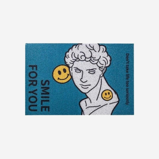 Moderní designová rohožka se sochou