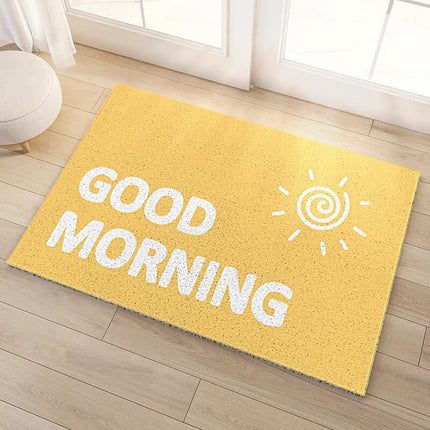 Žlutá rohožka s nápisem Good Morning
