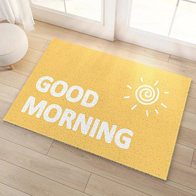 Žlutá rohožka s nápisem Good Morning