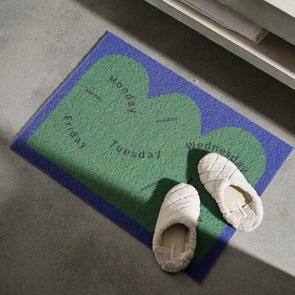 Designová rohožka ke vstupním dveřím