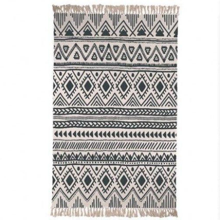 Berberský koberec jako předložka k posteli