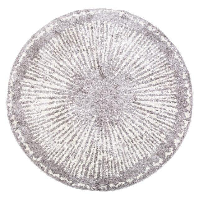 Kulatý šedý koberec v berberském stylu