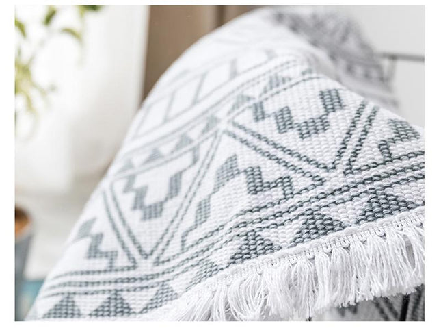 Kulatý koberec do ložnice s třásněmi