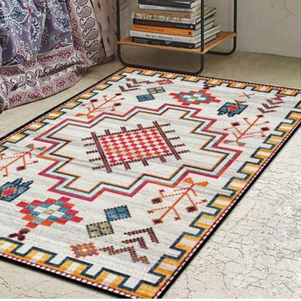 Červeno-žlutý koberec s etno vzorem