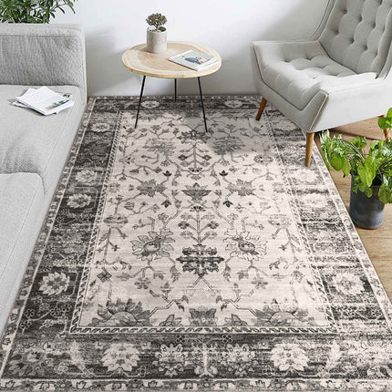 Šedo-bílý koberec ve vintage stylu